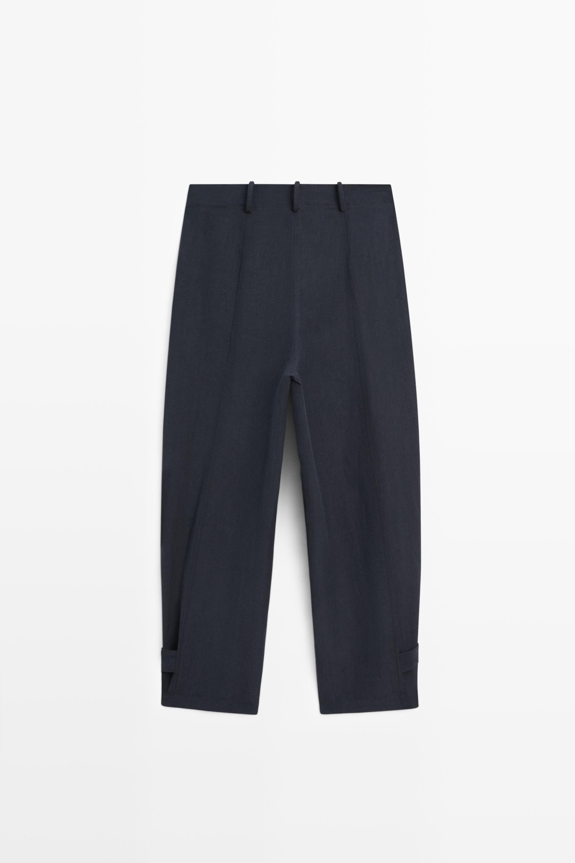 Flowing linen blend pants with buttoned tab detail